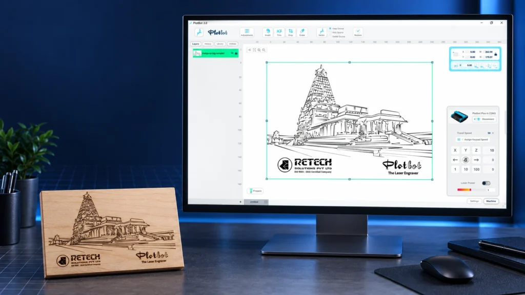 Plotbot laser software on a desktop monitor showing a temple line drawing ready to engrave, next to the finished engraved wooden plaque